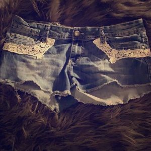 Jean shorts with lace trimmings